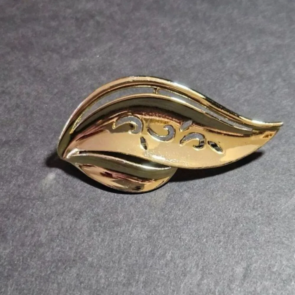 AJC vintage gold tone brooch